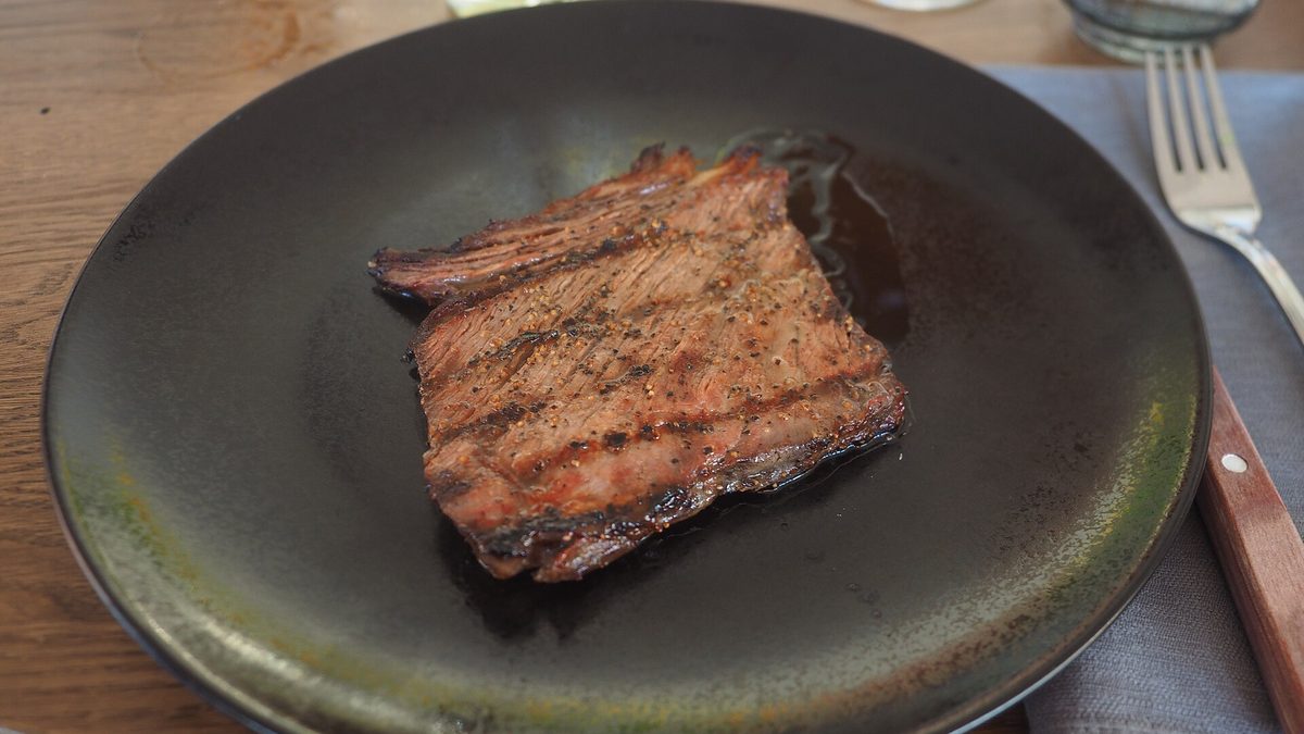Grilled steak, representative of the grill
